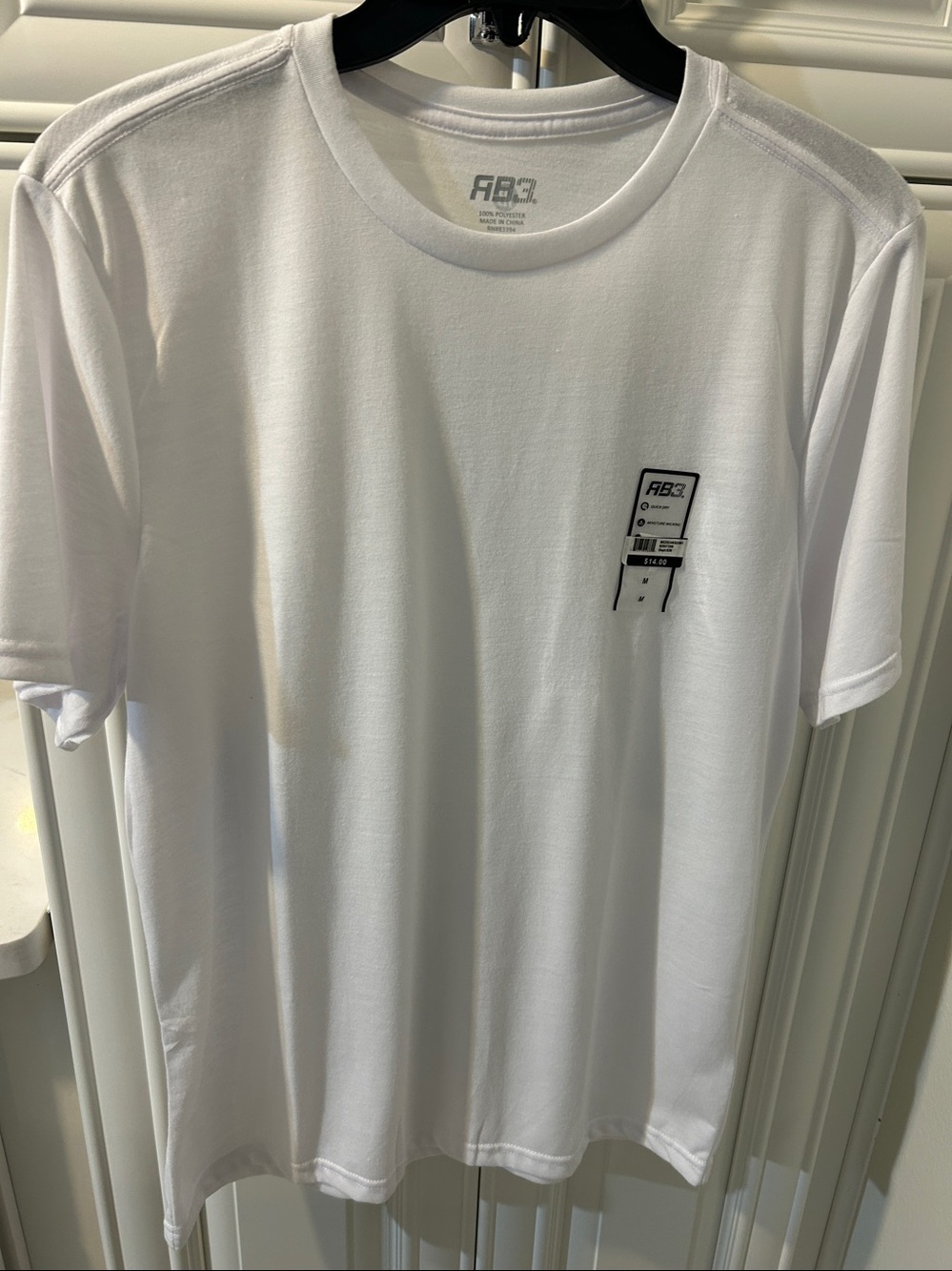 Men's White Crewneck Tee with Subtle Chest Graphic